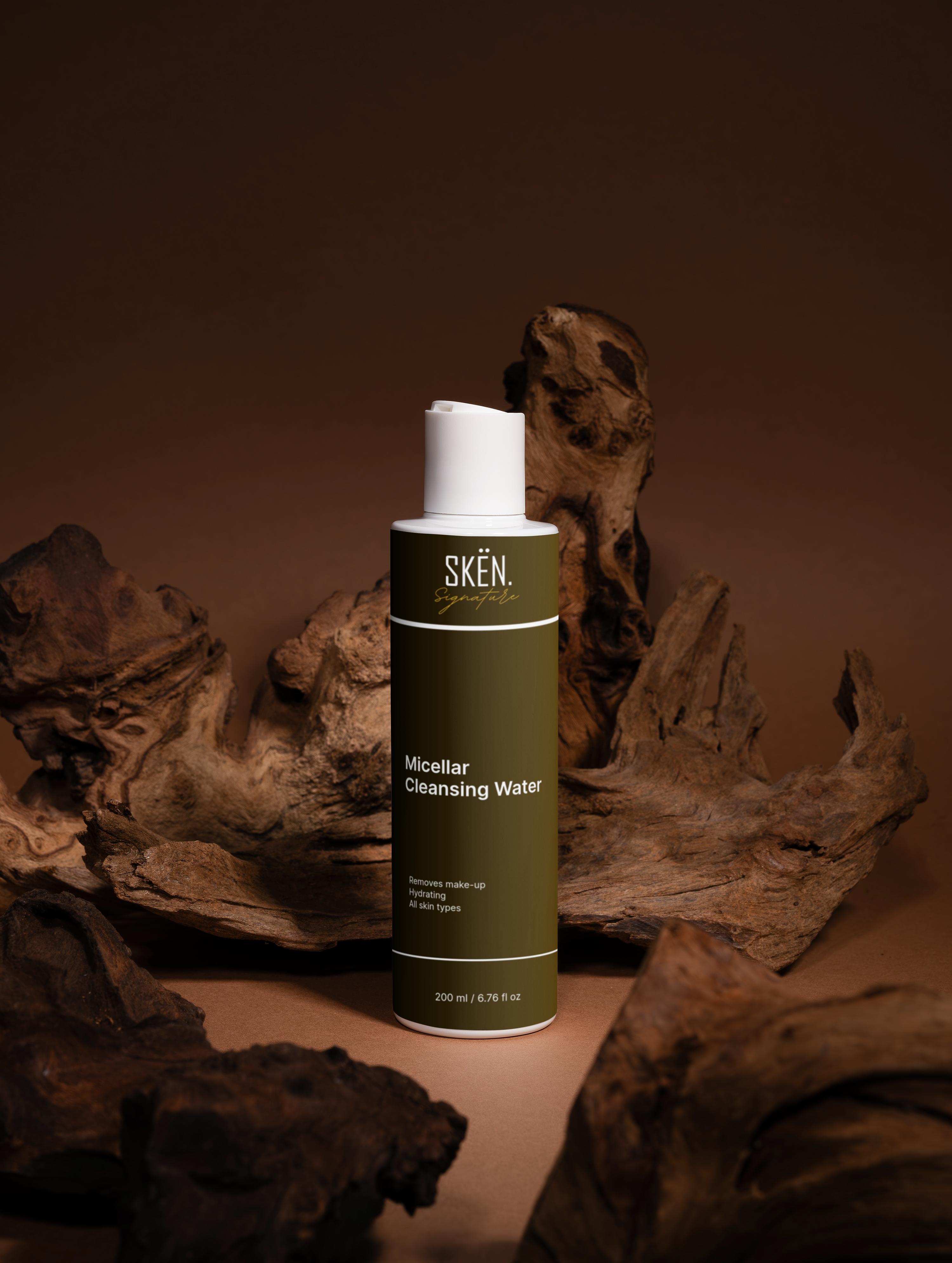 Sken micellar cleansing water bottle on a brown background with natural elements.